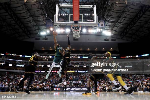 Xavier Silas of the Ball Hogs attempts a shot against the Killer 3s during week six of the BIG3 three on three basketball league at American Airlines...