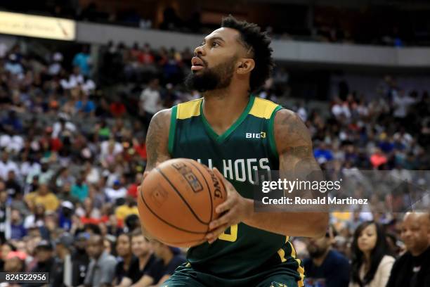 Xavier Silas of the Ball Hogs handles the ball against the Killer 3s during week six of the BIG3 three on three basketball league at American...