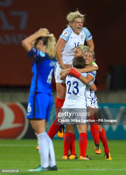 England's Millie Bright celebrates with team mates after the final whistle of the UEFA Women's Euro 2017 quarter final match at the Stadion De...