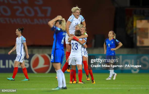 England's Millie Bright celebrates with team mates after the final whistle of the UEFA Women's Euro 2017 quarter final match at the Stadion De...