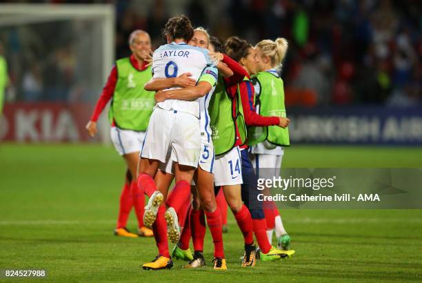 Steph Houghton of England Women picks up Jodie Taylor of England Women as the celebrate after the UEFA Women's Euro 2017 match between England and...