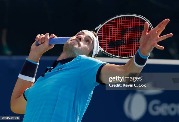 John Isner serves to Ryan Harrison during the BB&T Atlanta Open at Atlantic Station on July 30, 2017 in Atlanta, Georgia.