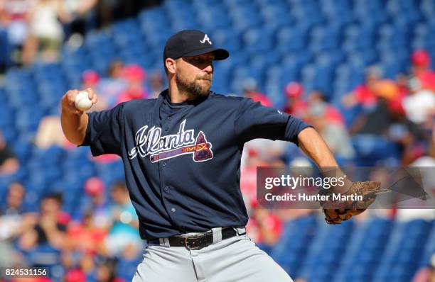 Jim Johnson of the Atlanta Braves throws a pitch in the eighth inning during a game against the Philadelphia Phillies at Citizens Bank Park on July...