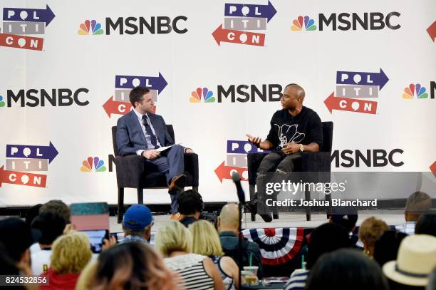 Ari Melber and Charlamagne tha God at the 'MSNBC: Hip Hop And Politics' panel during Politicon at Pasadena Convention Center on July 30, 2017 in...