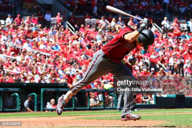 Jake Lamb of the Arizona Diamondbacks slams his bat after flying out against the St. Louis Cardinals in the fourth inning at Busch Stadium on July...