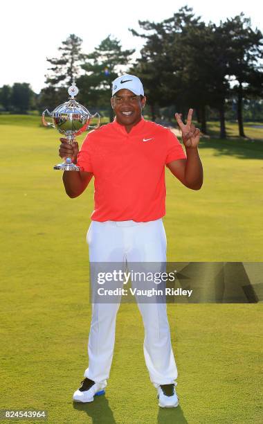 Jhonattan Vegas of Venezuela poses with the trophy following the final round of the RBC Canadian Open at Glen Abbey Golf Club on July 30, 2017 in...