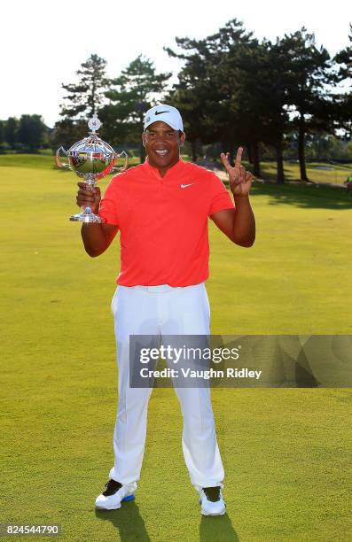 Jhonattan Vegas of Venezuela poses with the trophy following the final round of the RBC Canadian Open at Glen Abbey Golf Club on July 30, 2017 in...