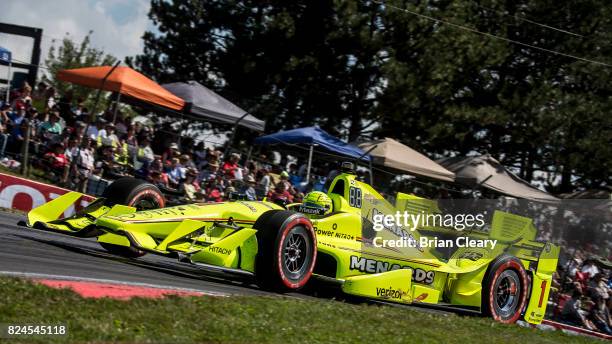 Simon Pagenaud, of France, drives the Chevrolet IndyCar on the track during the Verizon IndyCar Series Honda Indy 200 race at Mid-Ohio Sports Car...