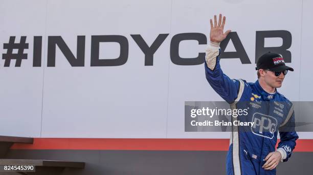 Josef Newgarden celebrates after winning the Verizon IndyCar Series Honda Indy 200 race at Mid-Ohio Sports Car Course on July 30, 2017 in Mansfield,...