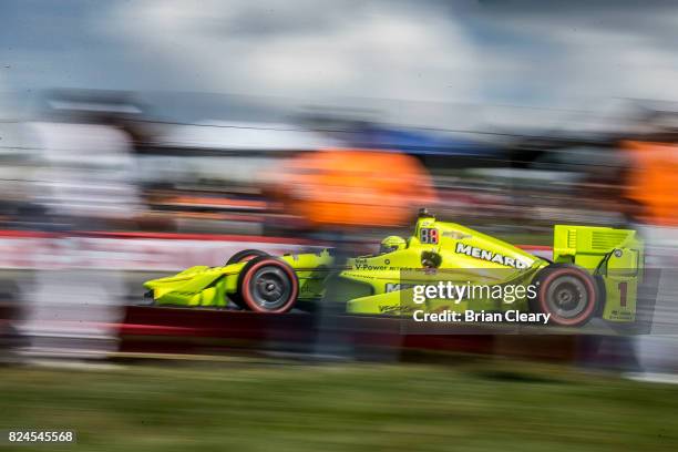 Simon Pagenaud, of France, drives the Chevrolet IndyCar on the track during the Verizon IndyCar Series Honda Indy 200 race at Mid-Ohio Sports Car...