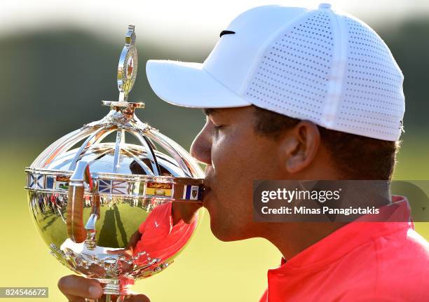 Jhonattan Vegas of Venezuela poses with the trophy following the final round of the RBC Canadian Open at Glen Abbey Golf Club on July 30, 2017 in...