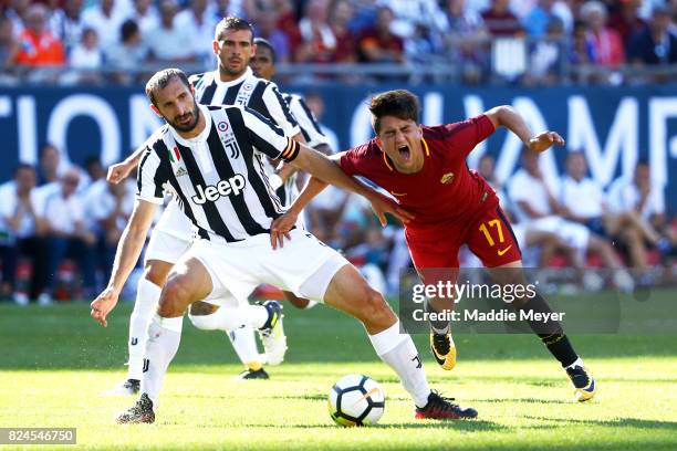 Giorgio Chiellini of Juventus and Cengiz Under of Roma battle for control of the ball during the International Champions Cup 2017 match at Gillette...