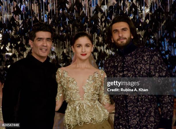 Manish Malhotra, Alia Bhatt and Ranveer Singh at the FDCI's India Couture Week 2017 at the Taj Palace hotel on July 30, 2017 in New Delhi, India.