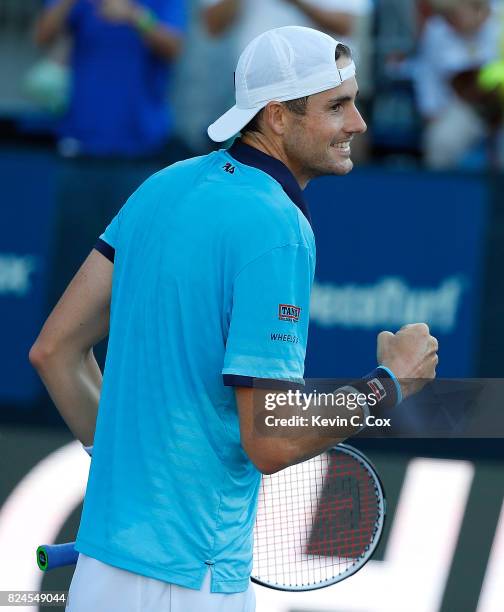 John Isner reacts after defeating Ryan Harrison during the BB&T Atlanta Open at Atlantic Station on July 30, 2017 in Atlanta, Georgia.