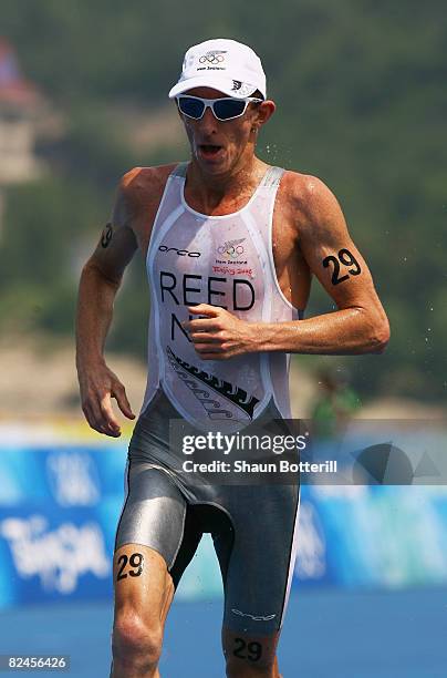 Shane Reed of New Zealand competes in the running portion of the Men's Triathlon Final at the Triathlon Venue on Day 11 of the Beijing 2008 Olympic...