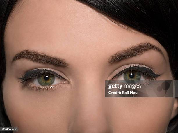 portrait of female eyes - eye liner stock-fotos und bilder