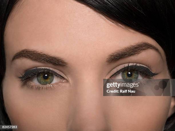 portrait of female eyes - eye liner stock pictures, royalty-free photos & images