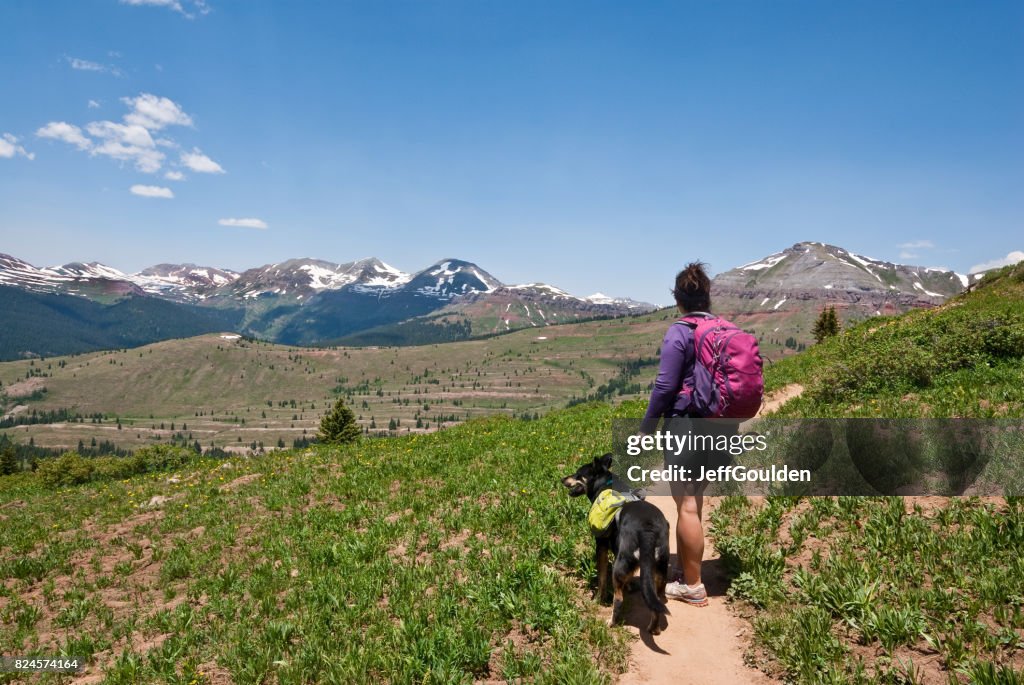 Young Woman Hiker on the Colorado Trail with Her Dog