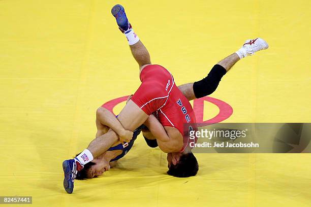 Henry Cejudo of the United States competes against Shingo Matsumoto of Japan for the gold medal in the men's 55kg freestyle wrestling event at the...