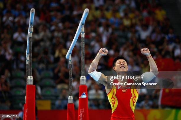 Li Xiaopeng of China reacts after competing in the artistic gymnastics event at the National Indoor Stadium on Day 11 of the Beijing 2008 Olympic...