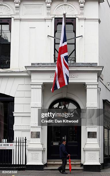 The Union Jack flies above Gieves and Hawkes at No 1 Savile Row on August 18, 2008 in London, England. A bespoke two piece suit takes up to eight...