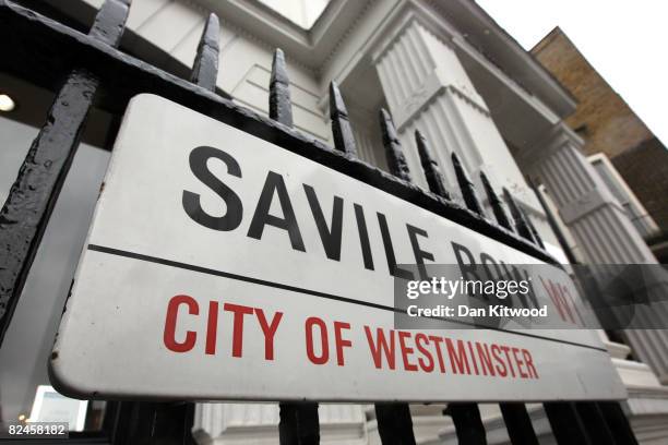 Street sign shows the location of bespoke tailor Gieves and Hawkes on August 18, 2008 in London, England. A bespoke two piece suit takes up to eight...