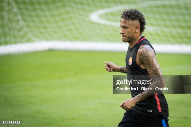 Neymar of Barcelona runs back for the ball during the training session for the International Champions Cup El Clásico match between FC Barcelona and...