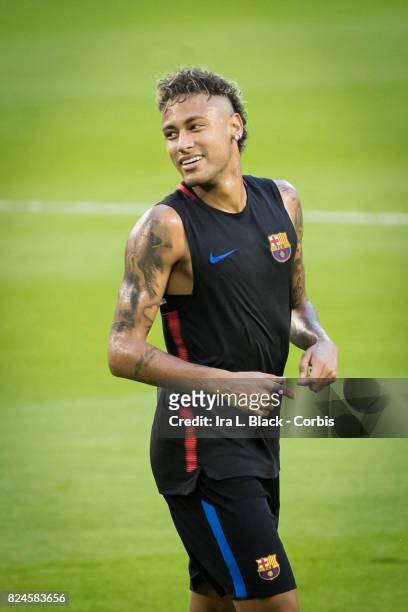 Neymar of Barcelona smiles during the training session for the International Champions Cup El Clásico match between FC Barcelona and Real Madrid at...