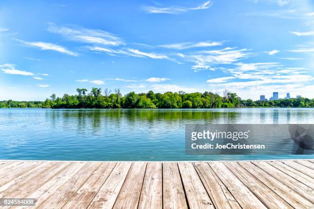 dock on lake in the city of lakes - minneapolis - dock imagens e fotografias de stock