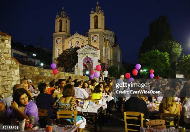 Greek People celebrate the christening of a baby with their traditional dance sirtaci on July 20, 2008 in Sianna, Rhodes, Greece. Rhodes is the...