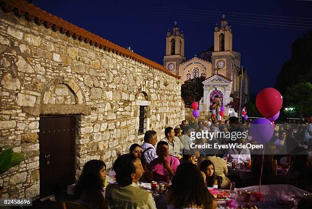 Greek People celebrate the christening of a baby with their traditional dance sirtaci on July 20, 2008 in Sianna, Rhodes, Greece. Rhodes is the...