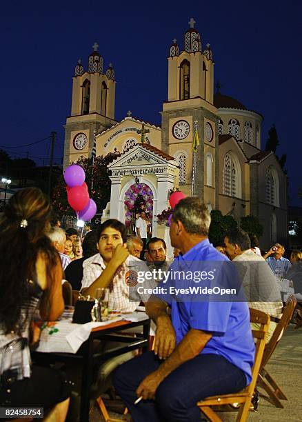 Greek People celebrate the christening of a baby with their traditional dance sirtaci on July 20, 2008 in Sianna, Rhodes, Greece. Rhodes is the...