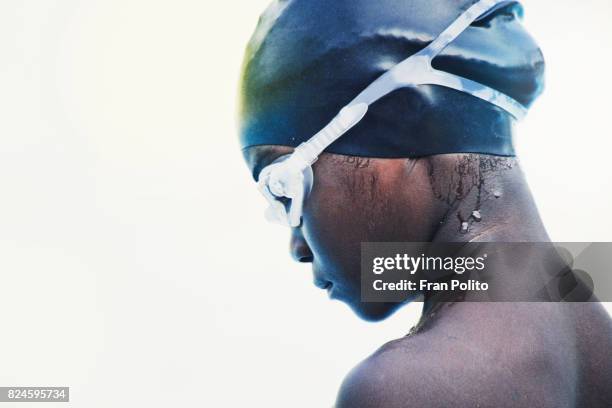 young swimmer. - swimming cap stock pictures, royalty-free photos & images