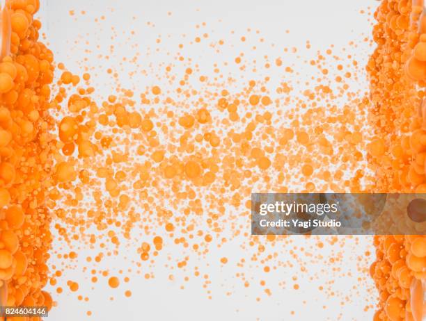 oil ink in water on white background - dissolvere foto e immagini stock