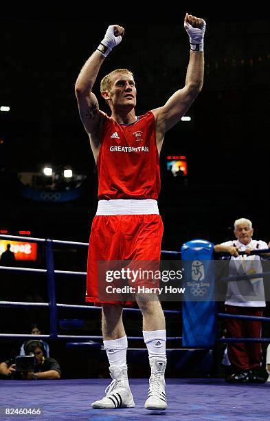 Tony Jeffries of Great Britain celebrates after defeating Imre Szello of Hungary during the 81kg quarterfinal boxing event at the Workers' Indoor...
