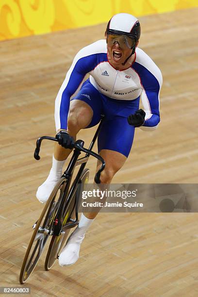 Chris Hoy of Great Britain celebrates the gold medal after defeating Jason Kenny of Great Britain in the Men's Sprint Finals in the track cycling...