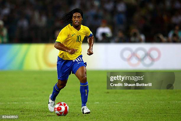 Ronaldinho of Brazil controls the ball during the men's football semifinal match between Argentina and Brazil at Workers' Stadium on Day 11 of the...