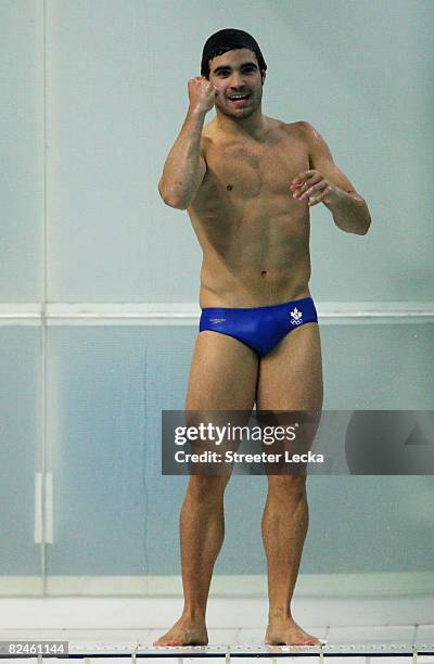 Alexandre Despatie of Canada celebrates winning silver medal in the Men's 3m Springboard Fiinal at the National Aquatics Center on Day 11 of the...