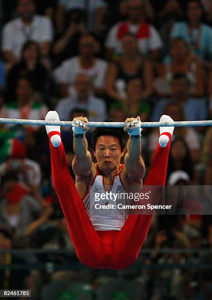 Takuya Nakase of Japan competes in the Men's Horizontal Bar Final at the National Indoor Stadium on Day 11 of the Beijing 2008 Olympic Games on...