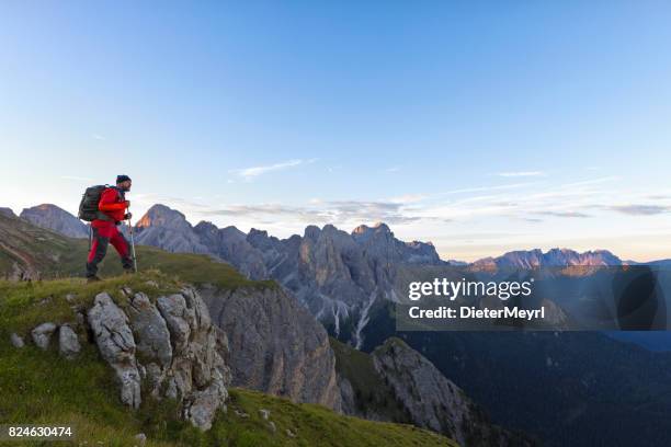 hiker at catinaccio, rosengarten mountain group, dolomites - catinaccio rosengarten stock pictures, royalty-free photos & images