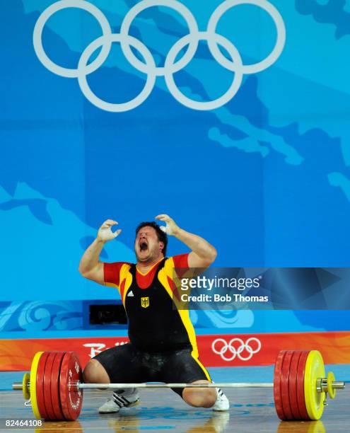 Matthias Steiner of Germany celebrates victory in the Men's 105 kg group weightlifting event at the Beijing University of Aeronautics & Astronautics...