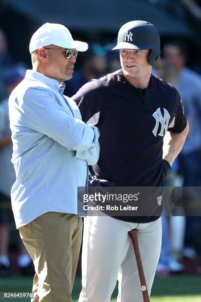 Reggie Jackson and Clint Frazier of the New York Yankees talk before the game against the Seattle Mariners at Safeco Field on July 22, 2017 in...