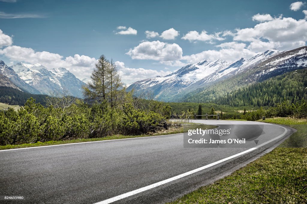 Curved empty road on mountain pass, San Bernardino, Switzerland