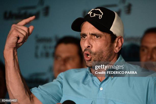 Venezuelan opposition leader and Miranda state governor Henrique Capriles and members of the opposition coalition Democratic Unity Roundtable , offer...