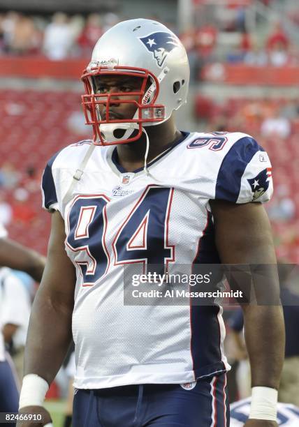 Defensive lineman Ty Warren of the New England Patriots watches play against the Tampa Bay Buccaneers at Raymond James Stadium on August 17, 2008 in...