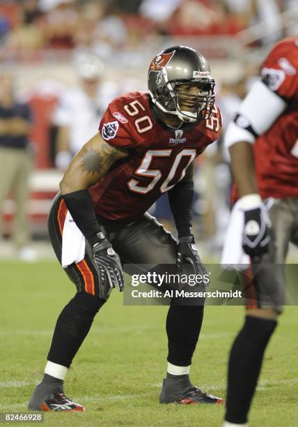 Linebacker Antoine Cash of the Tampa Bay Buccaneers lines up against the New England Patriots at Raymond James Stadium on August 17, 2008 in Tampa,...