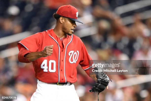 Edwin Jackson of the Washington Nationals celebrates a out in the seventh inning during game two of a doubleheader against the Colorado Rockies at...