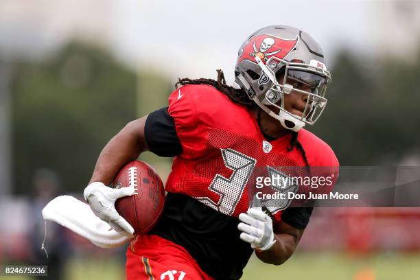 Runningback Jacquizz Rogers of the Tampa Bay Buccaneers works out during Training Camp at One Buc Place on July 30, 2017 in Tampa, Florida.