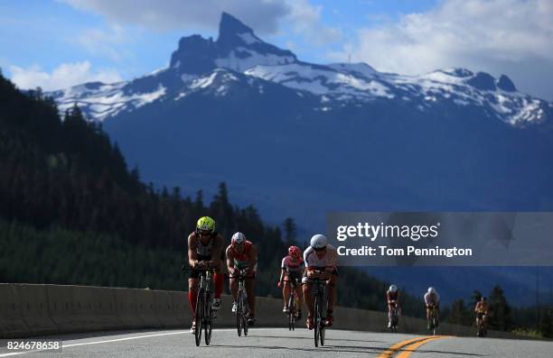 Athletes compete during the Subaru Ironman Canada triathlon on July 30, 2017 in Whistler, Canada.