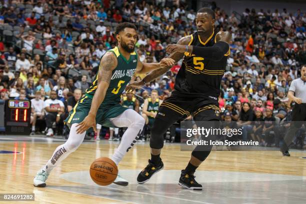 Ball Hogs guard Xavier Silas drives to the basket as Killer 3s guard Stephen Jackson defends during the Big3 basketball game between the Ball Hogs...